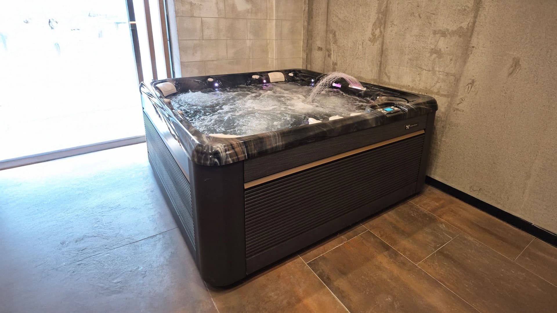 Caldera Spas® Seychelles Hot Tub and Auroom® Vulcana Sauna at Downtown Bucharest
