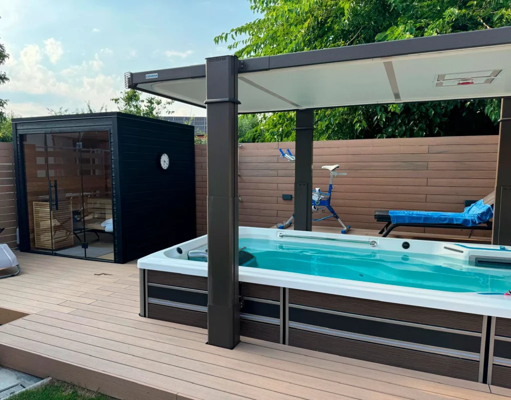 Auroom Mira L sauna and E500 Endless Pools swimspa located on the terrace