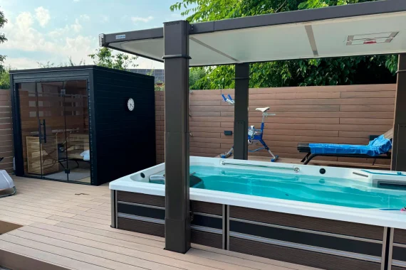 Auroom Mira L sauna and E500 Endless Pools swimspa located on the terrace